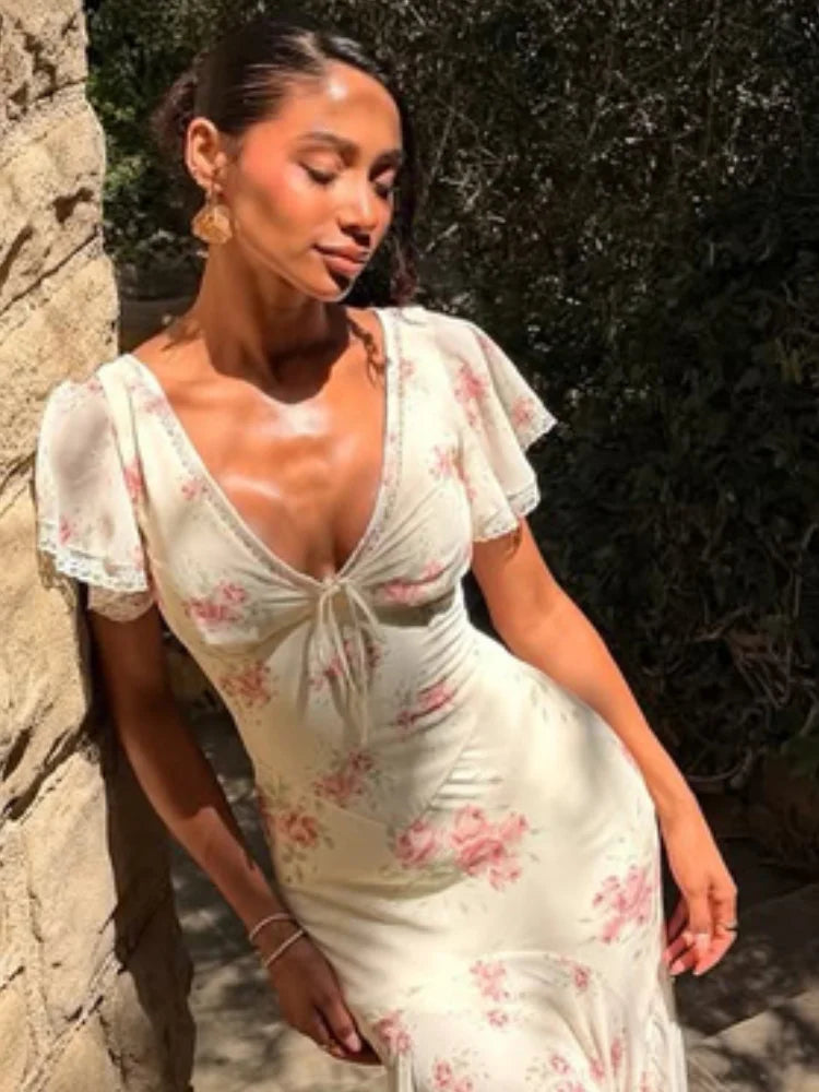 Damen Kleid mit Blumenmuster V-Ausschnitt Flatterärmeln Plisseefalten und betonter Taille