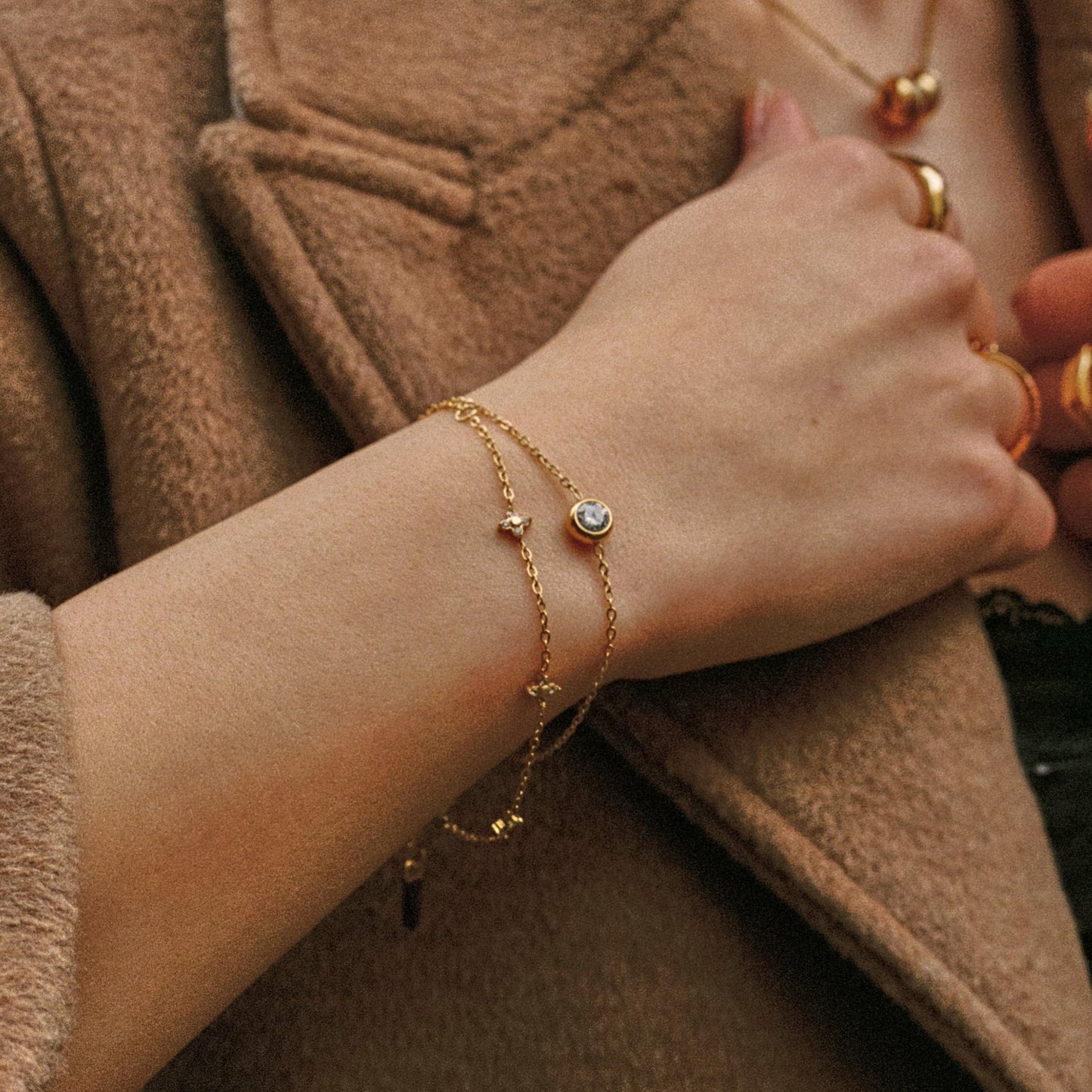Damen Armband Gold mit weißem Zirkon verstellbar wasserfest hypoallergen Edelstahl