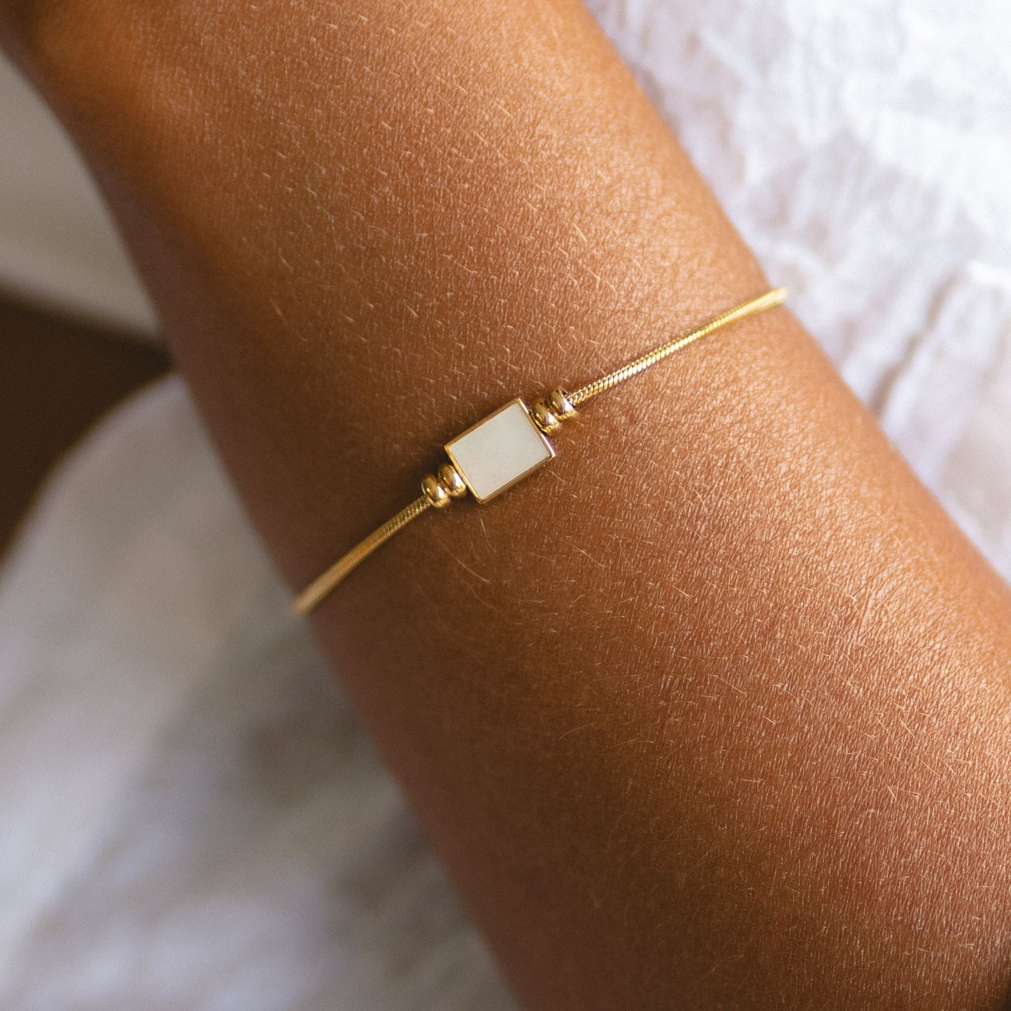 Damen Armband gold Perlmutt Schlangenkette Edelstahl wasserfest