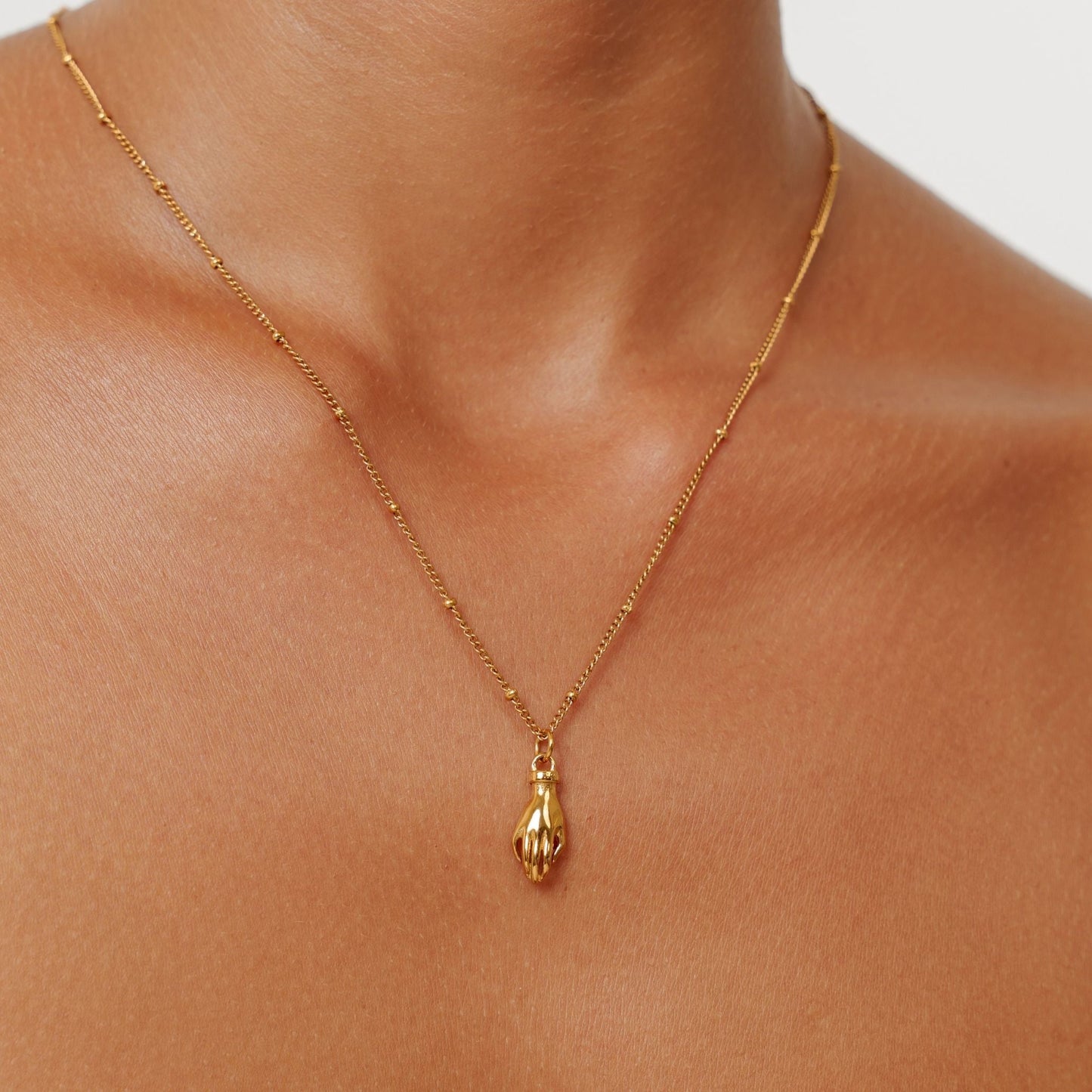 Damen Schutz Hand Halskette Gold mit grünem Zirkon wasserfest