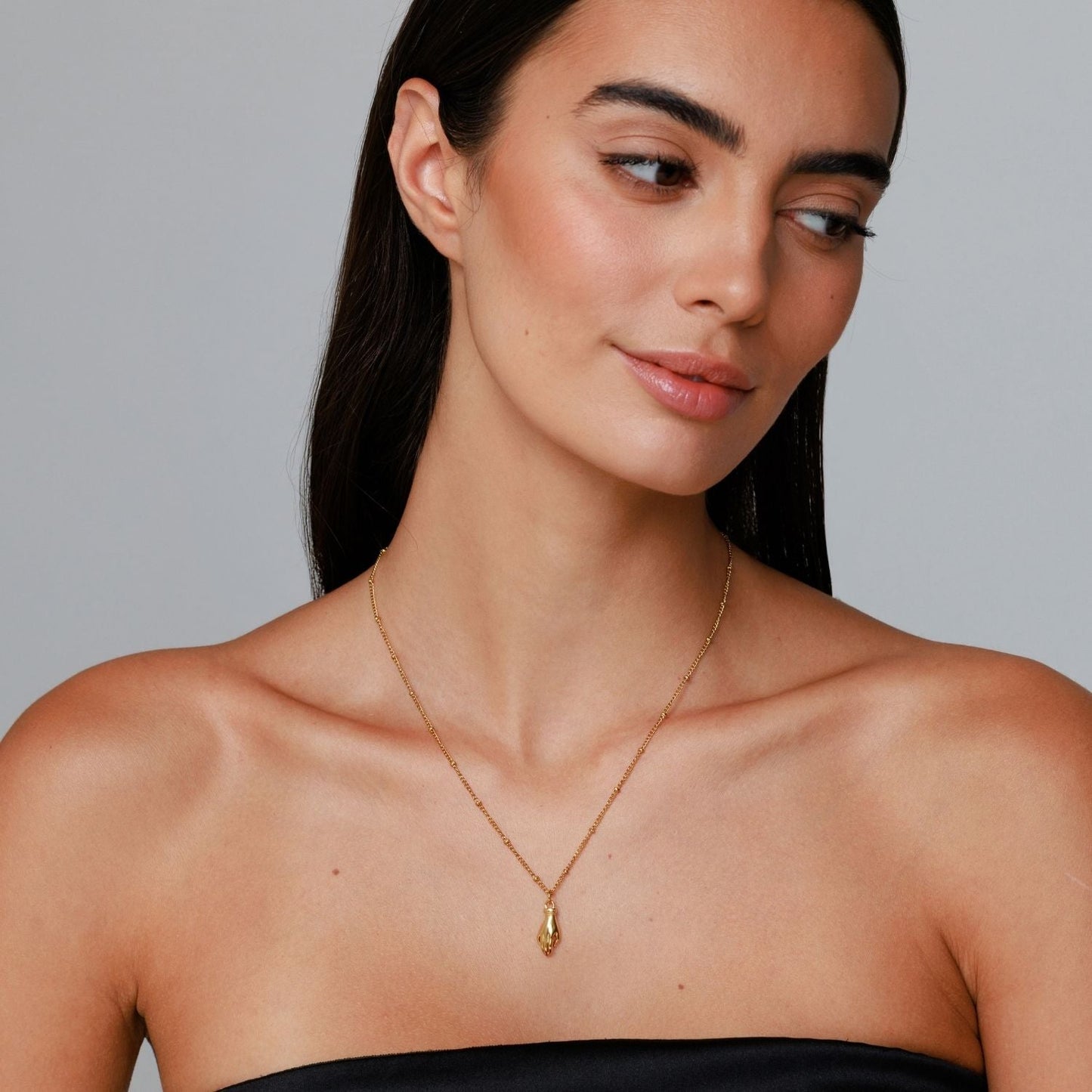 Damen Schutz Hand Halskette Gold mit grünem Zirkon wasserfest